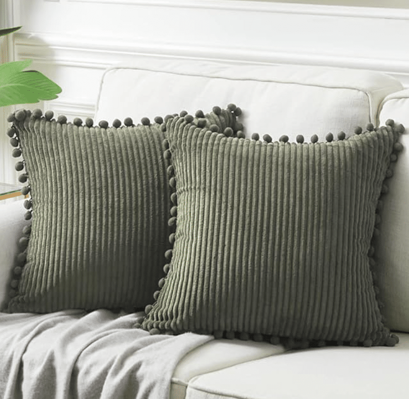 Pillows are a great way to add a pop of color to your fall decor! | The Dating Divas