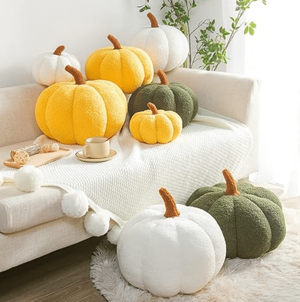 These plush pumpkins make cute fall decor for your couch! | The Dating Divas