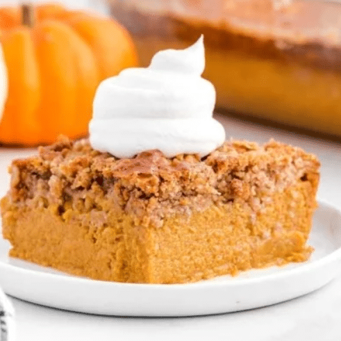 This Pumpkin Dump Cake is going to be a hit as one of your Thanksgiving desserts! | The Dating Divas